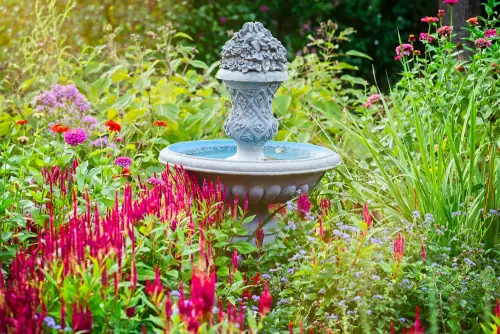 Fountain in a flower bed